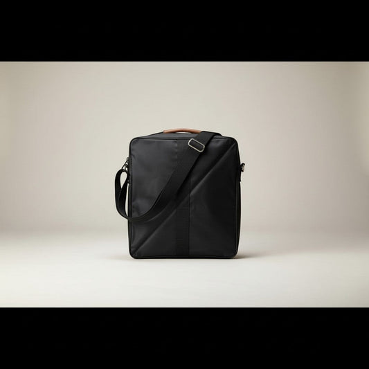 Fixed Price Shop black nylon duffle bag with brown leather handle and adjustable shoulder strap, featuring side pockets.