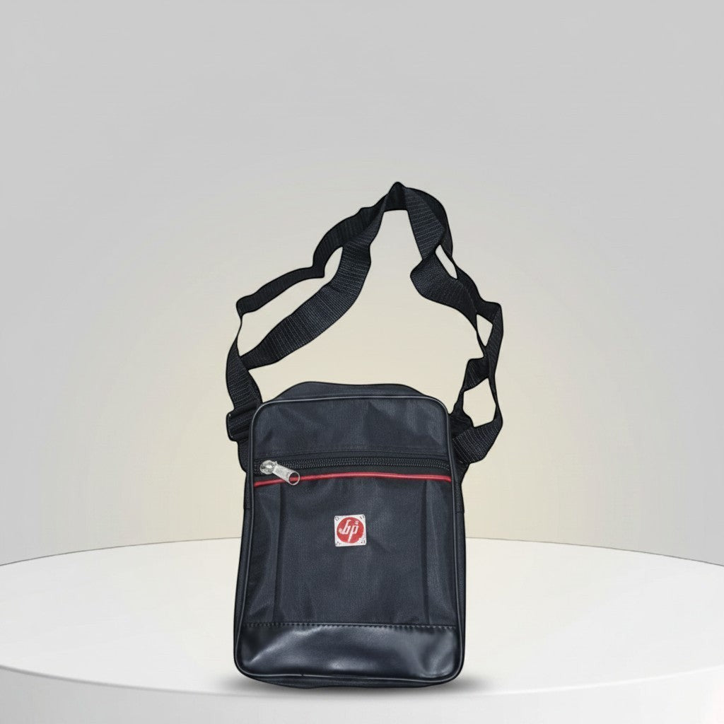 Fixed Price Shop black nylon cross body bag with red zipper trim and logo patch. Adjustable strap.