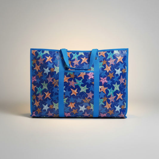 Fixed Price Shop blue non-woven storage bag with a colorful star pattern, zipper closure, and blue strip handles.
