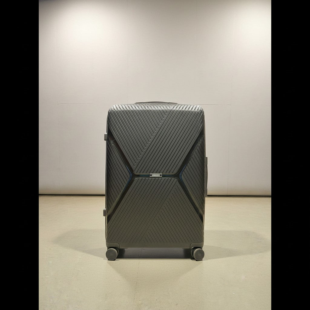 Fixed Price Shop American Tourister dark grey textured polypropylene spinner luggage with TSA lock and expandable zipper.