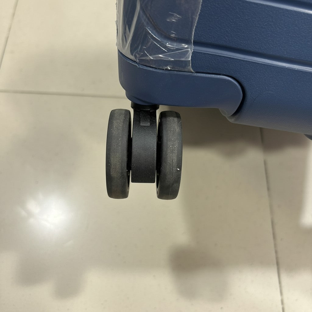 Fixed Price Shop American Tourister navy blue hardside luggage with 360-degree spinner wheels.