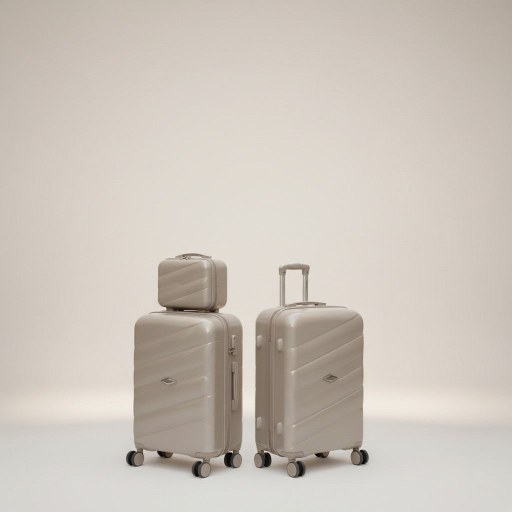 Fixed Price Shop beige polypropylene luggage set with TSA lock and expandable zipper, featuring a woman holding a suitcase.
