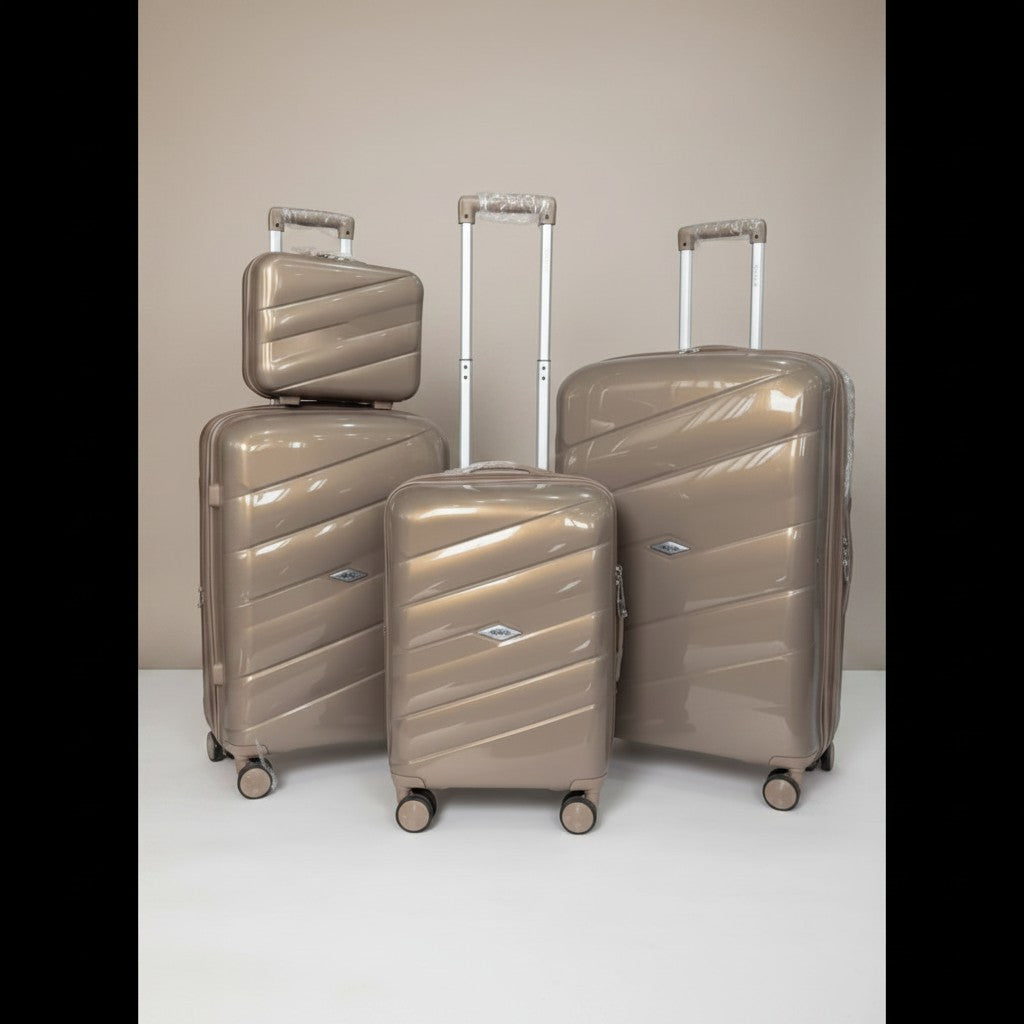 Fixed Price Shop Dovell champagne gold polypropylene luggage set with TSA lock and expandable zipper.