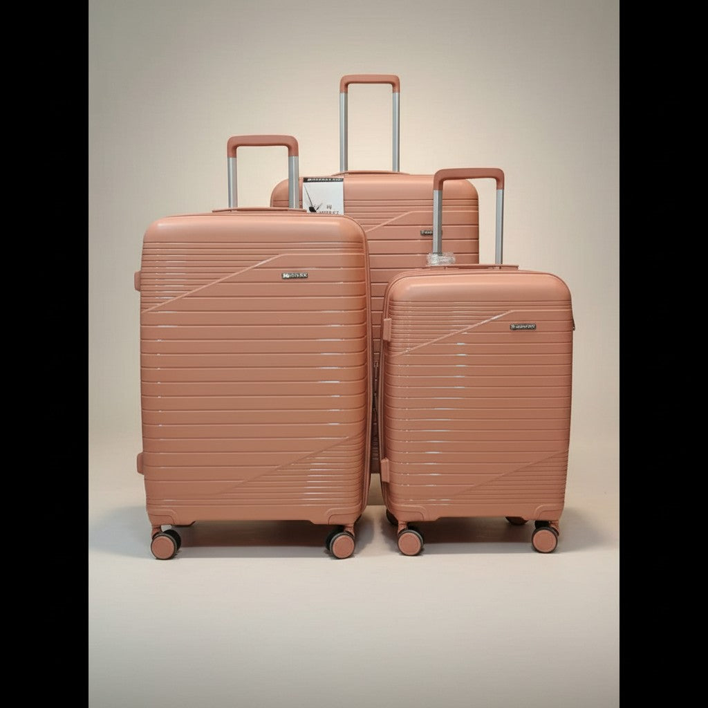Fixed Price Shop Minister 3-piece rose gold luggage set with expandable capacity and 360" wheels made of durable PP material.