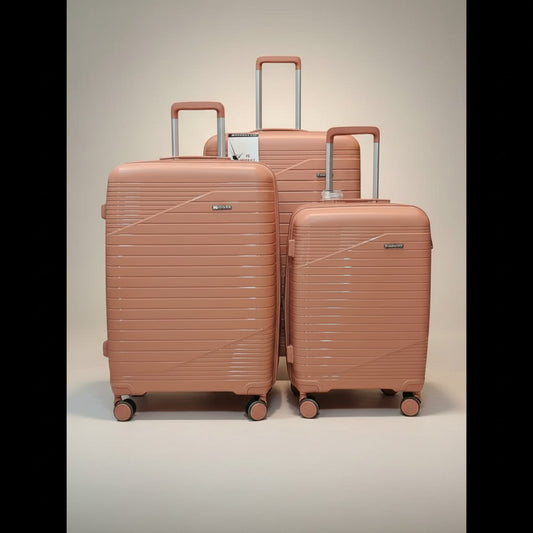 Fixed Price Shop Minister 3-piece rose gold luggage set with expandable capacity and 360" wheels made of durable PP material.