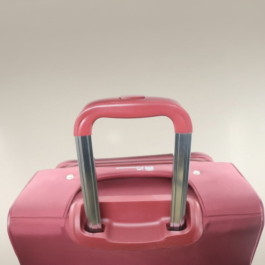 Fixed Price Shop UK Parliament red nylon expandable suitcase with numeric lock and 360-degree wheels.