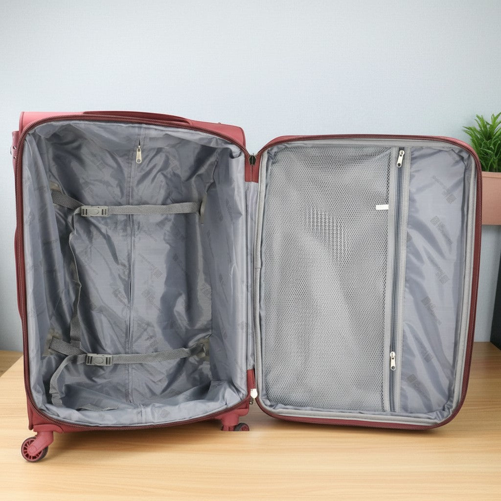 Fixed Price Shop UK Parliament red nylon suitcase interior with packing straps and mesh zippered compartment.